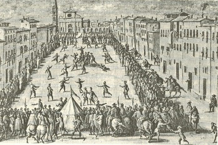 Reprodução de: 'Kulturgeschichte des Sports', C.H.Beck, p.181: Fresco por Jan van der Straet: ‘Calcio’ jogado em frente de Santa Maria Novella, 1558 (Palazzo Vecchio, em Florença) Reprodução de: 'Kulturgeschichte des Sports', C.H.Beck, p.181: Fresco por Jan van der Straet: ‘Calcio’ jogado em frente de Santa Maria Novella, 1558 (Palazzo Vecchio, em Florença)